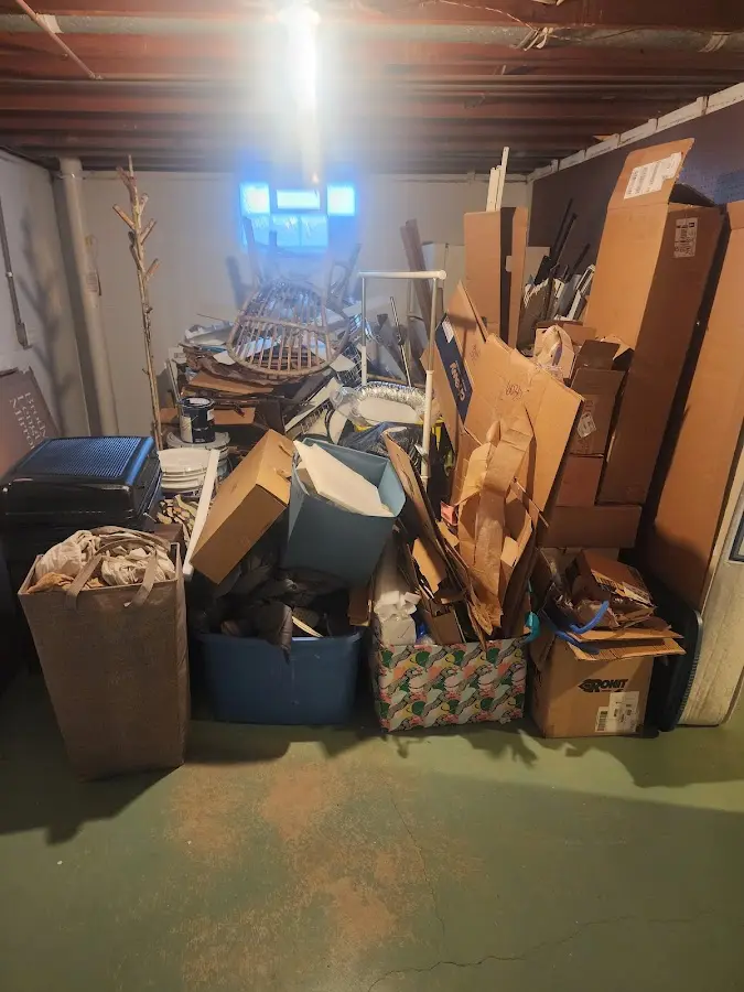 Roll-off dumpster container at job site for 2 Yard Dumpster Rental in Sachse